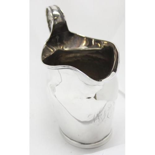 1047 - A Georgian silver cream jug of helmet form, London 1796, makers mark rubbed, approx 10cm tall, appro... 