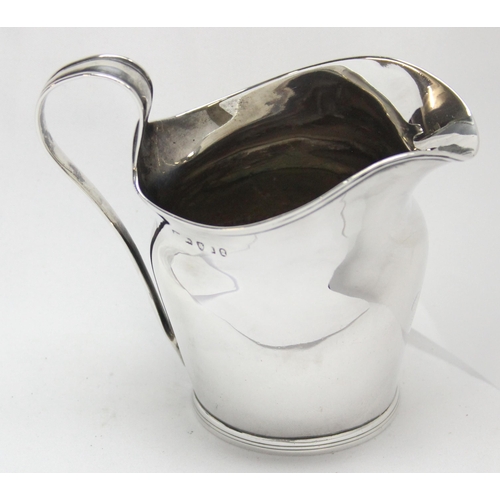 1047 - A Georgian silver cream jug of helmet form, London 1796, makers mark rubbed, approx 10cm tall, appro... 