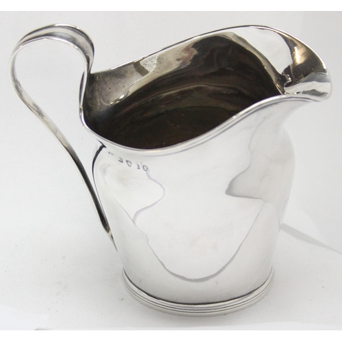 1047 - A Georgian silver cream jug of helmet form, London 1796, makers mark rubbed, approx 10cm tall, appro... 