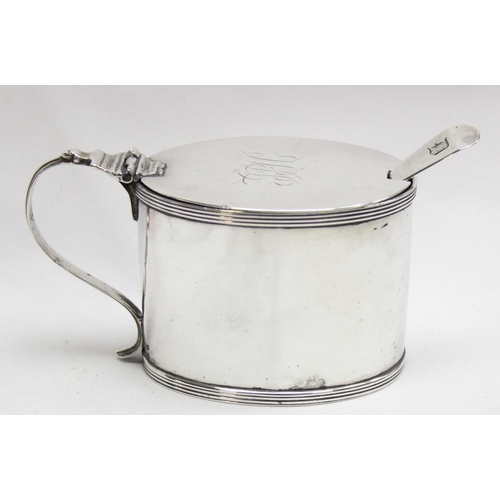 1048 - A Georgian silver mustard port of large form, marked for London 1788 by Henry Chawner, with blue gla... 