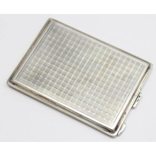 1053 - A vintage .900 silver cigarette case with engine turned decoration, marked 900 and XRF confirmed, ap... 