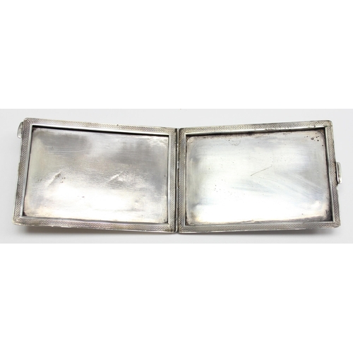 1053 - A vintage .900 silver cigarette case with engine turned decoration, marked 900 and XRF confirmed, ap... 