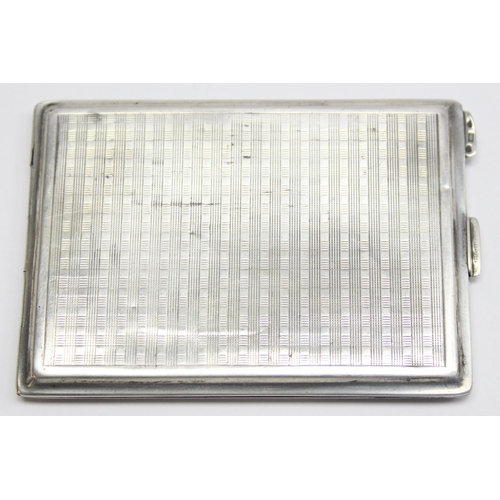 1053 - A vintage .900 silver cigarette case with engine turned decoration, marked 900 and XRF confirmed, ap... 