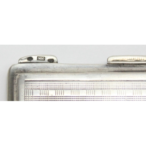 1053 - A vintage .900 silver cigarette case with engine turned decoration, marked 900 and XRF confirmed, ap... 