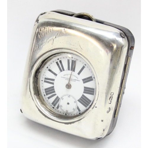 1054 - An antique silver pocket watch stand containing pocket watch, marked for London 1904 by Goldsmiths &... 