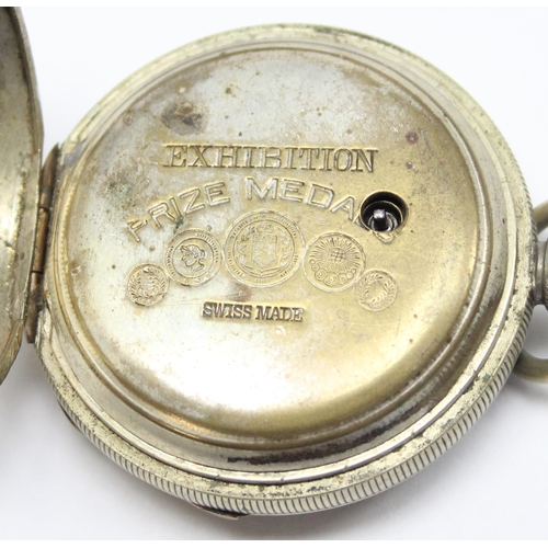 1054 - An antique silver pocket watch stand containing pocket watch, marked for London 1904 by Goldsmiths &... 