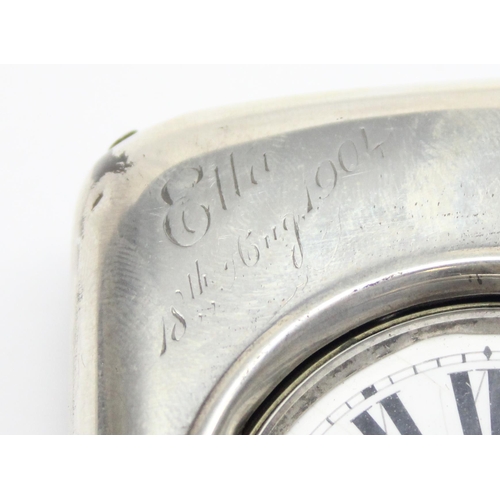 1054 - An antique silver pocket watch stand containing pocket watch, marked for London 1904 by Goldsmiths &... 