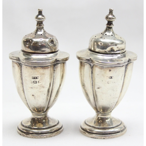 1076 - A pair of antique silver pepper pots, Birmingham 1921 by E S Barnsley & Co (Edward Souter Barnsley),... 