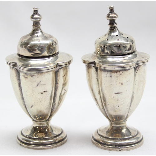 1076 - A pair of antique silver pepper pots, Birmingham 1921 by E S Barnsley & Co (Edward Souter Barnsley),... 