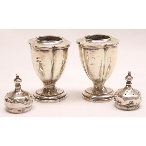 1076 - A pair of antique silver pepper pots, Birmingham 1921 by E S Barnsley & Co (Edward Souter Barnsley),... 