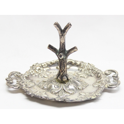 1078 - An Edwardian silver dressing table ring tree with embossed tray, Birmingham 1903 by Robert Pringle, ... 