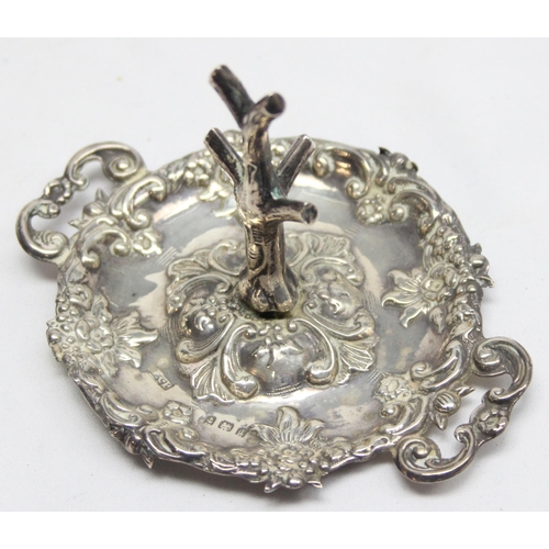 1078 - An Edwardian silver dressing table ring tree with embossed tray, Birmingham 1903 by Robert Pringle, ... 