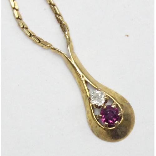 1110P - A vintage diamond and ruby set drop pendant with 9ct gold flat c-link chain, marked and XRF confirme... 