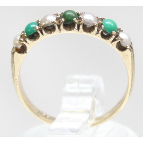 1194 - A vintage 9ct gold seed pearl and green stone ring, marked 9ct and XRF confirmed, approx size M, app... 