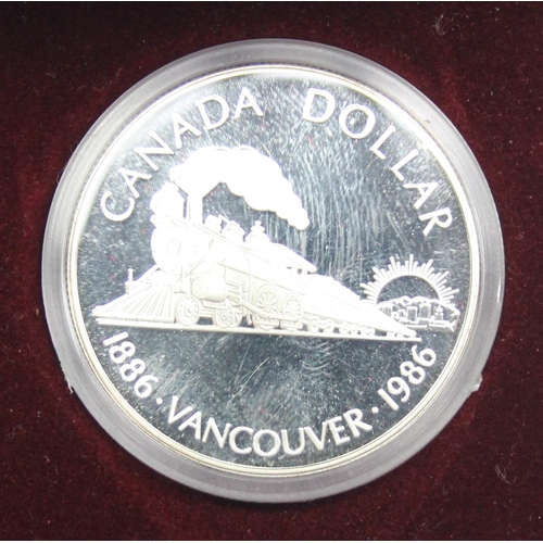 1254 - 3 boxed Canadian silver dollar coins, 1985 National Parks, 1993 Stanley Cup & 1986 Vancouver, both 9... 