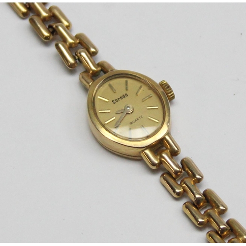 1330 - A vintage 9ct gold Strada watch, both gold case and strap, marked for Birmingham 1987 and XRF confir... 