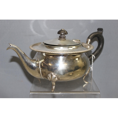 1020H - An early 20th century 4 piece silver plated tea set with ebony handles