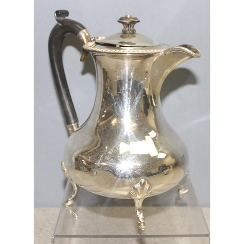 1020H - An early 20th century 4 piece silver plated tea set with ebony handles