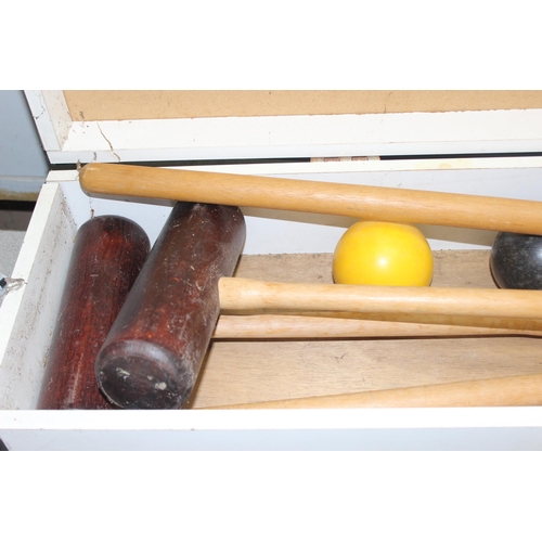 1520F - A Townsend Croquet set in box with 4 wooden mallets, 4 balls and hoops