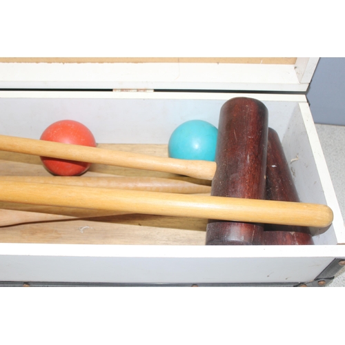 1520F - A Townsend Croquet set in box with 4 wooden mallets, 4 balls and hoops