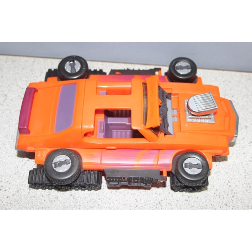 1569 - Qty of vintage toys to include Transformers and other vehicles