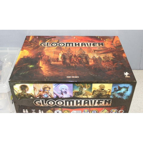 1573 - Gloomhaven; tactical combat fantasy board game with some associated accessories