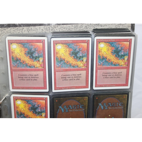 1593 - Single owner collection - A folder of red Magic the Gathering cards in plastic sleeves mostly from t... 