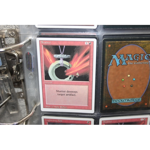 1593 - Single owner collection - A folder of red Magic the Gathering cards in plastic sleeves mostly from t... 