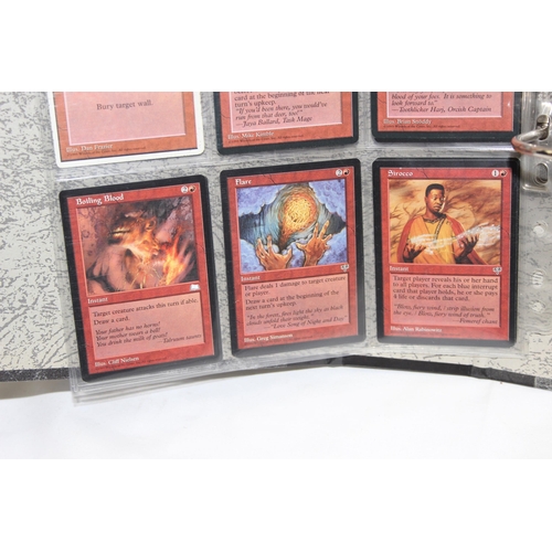 1593 - Single owner collection - A folder of red Magic the Gathering cards in plastic sleeves mostly from t... 