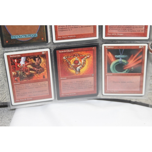 1593 - Single owner collection - A folder of red Magic the Gathering cards in plastic sleeves mostly from t... 