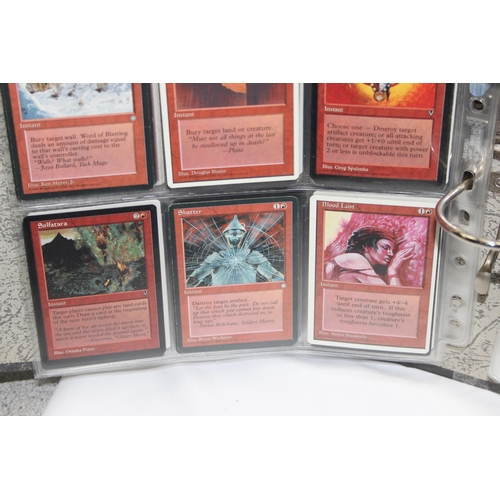 1593 - Single owner collection - A folder of red Magic the Gathering cards in plastic sleeves mostly from t... 