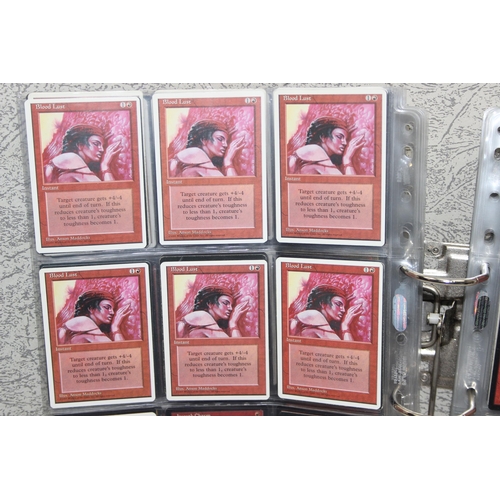 1593 - Single owner collection - A folder of red Magic the Gathering cards in plastic sleeves mostly from t... 