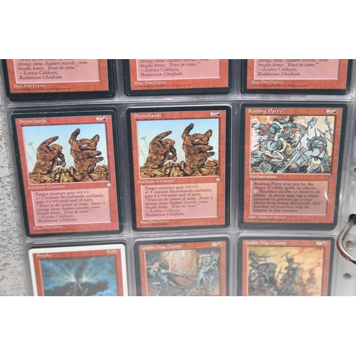 1593 - Single owner collection - A folder of red Magic the Gathering cards in plastic sleeves mostly from t... 