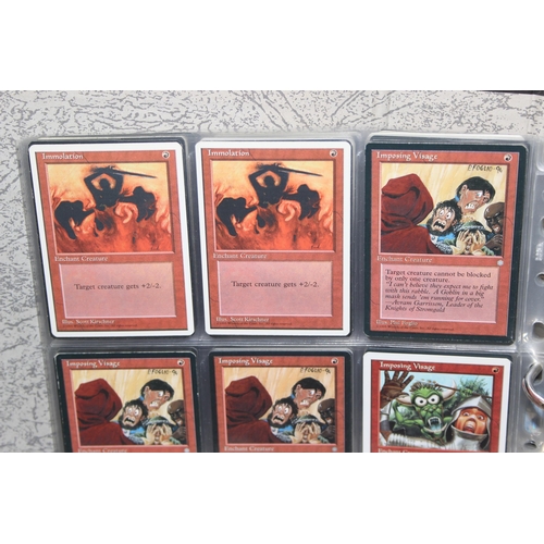 1593 - Single owner collection - A folder of red Magic the Gathering cards in plastic sleeves mostly from t... 