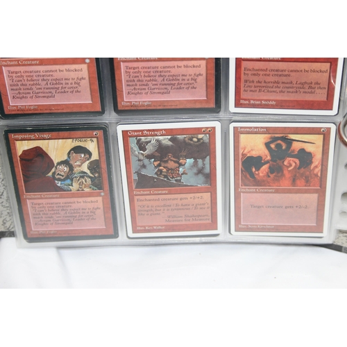 1593 - Single owner collection - A folder of red Magic the Gathering cards in plastic sleeves mostly from t... 