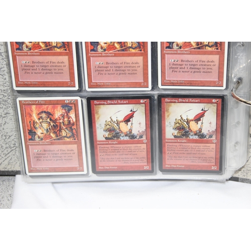 1593 - Single owner collection - A folder of red Magic the Gathering cards in plastic sleeves mostly from t... 