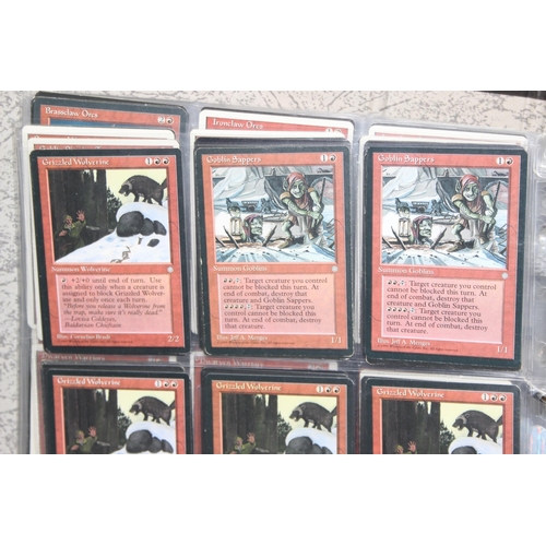 1593 - Single owner collection - A folder of red Magic the Gathering cards in plastic sleeves mostly from t... 