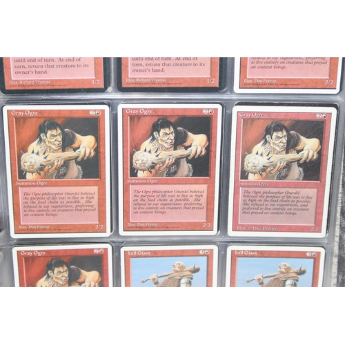 1593 - Single owner collection - A folder of red Magic the Gathering cards in plastic sleeves mostly from t... 