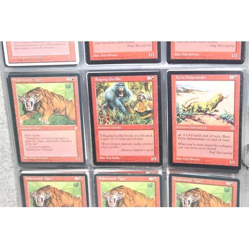 1593 - Single owner collection - A folder of red Magic the Gathering cards in plastic sleeves mostly from t... 