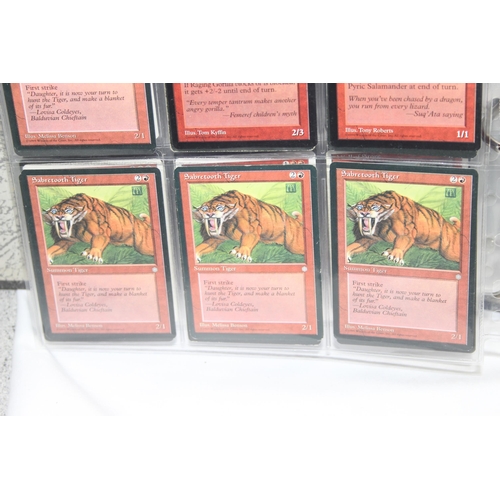 1593 - Single owner collection - A folder of red Magic the Gathering cards in plastic sleeves mostly from t... 