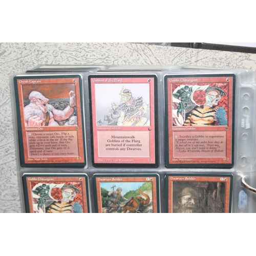 1593 - Single owner collection - A folder of red Magic the Gathering cards in plastic sleeves mostly from t... 