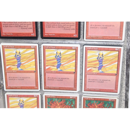 1593 - Single owner collection - A folder of red Magic the Gathering cards in plastic sleeves mostly from t... 