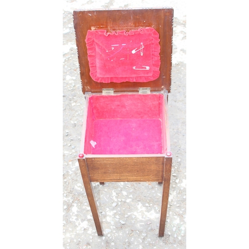 163 - A vintage oak sewing box and a brass topped side table, table approx 45cm wide x 45cm deep x 62cm ta... 