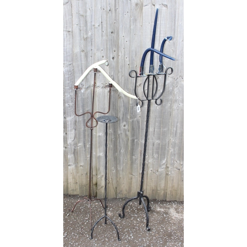 260 - 3 vintage wrought iron floor standing candlesticks, the largest approx 122cm tall