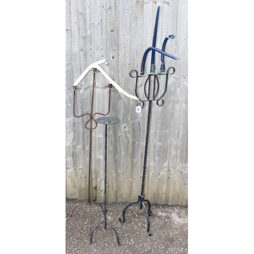 260 - 3 vintage wrought iron floor standing candlesticks, the largest approx 122cm tall