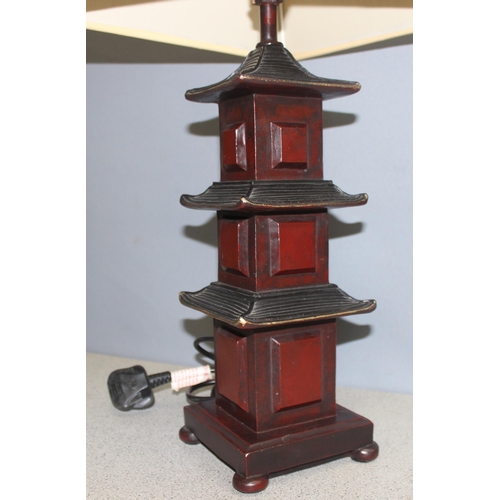 269L - An Oriental style pagoda table lamp with shade, Austin Designs home collection, approx 72cm tall