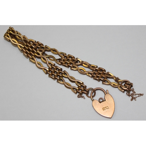 1103 - A vintage 9ct gold bracelet with heart shaped padlock clasp, various markings and XRF confirmed, app... 