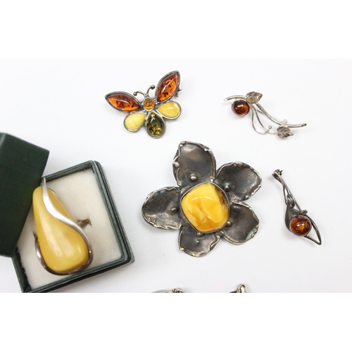 1128 - Qty of assorted silver and amber jewellery to inc 4 brooches, one formed as a butterfly, a silver an... 