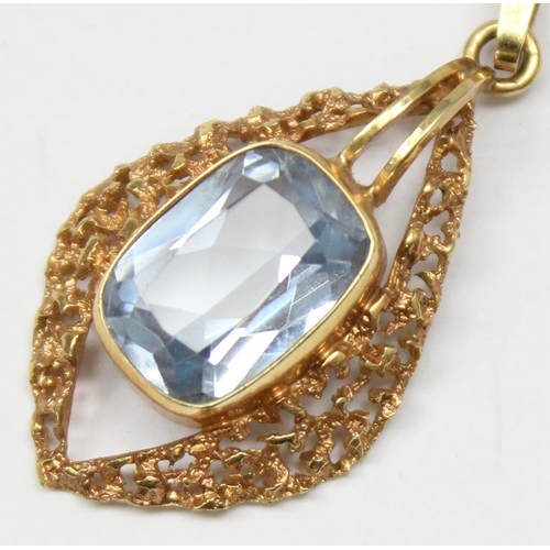 1138 - A vintage 9ct gold retro style pendant with facet cut blue stone centre on 9ct gold kerb link chain,... 