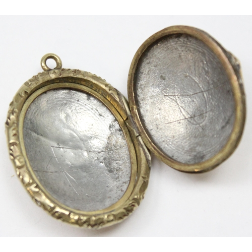 1149 - 2 antique gold plated lockets with engraved decorations, the largest approx 39mm x 29mm